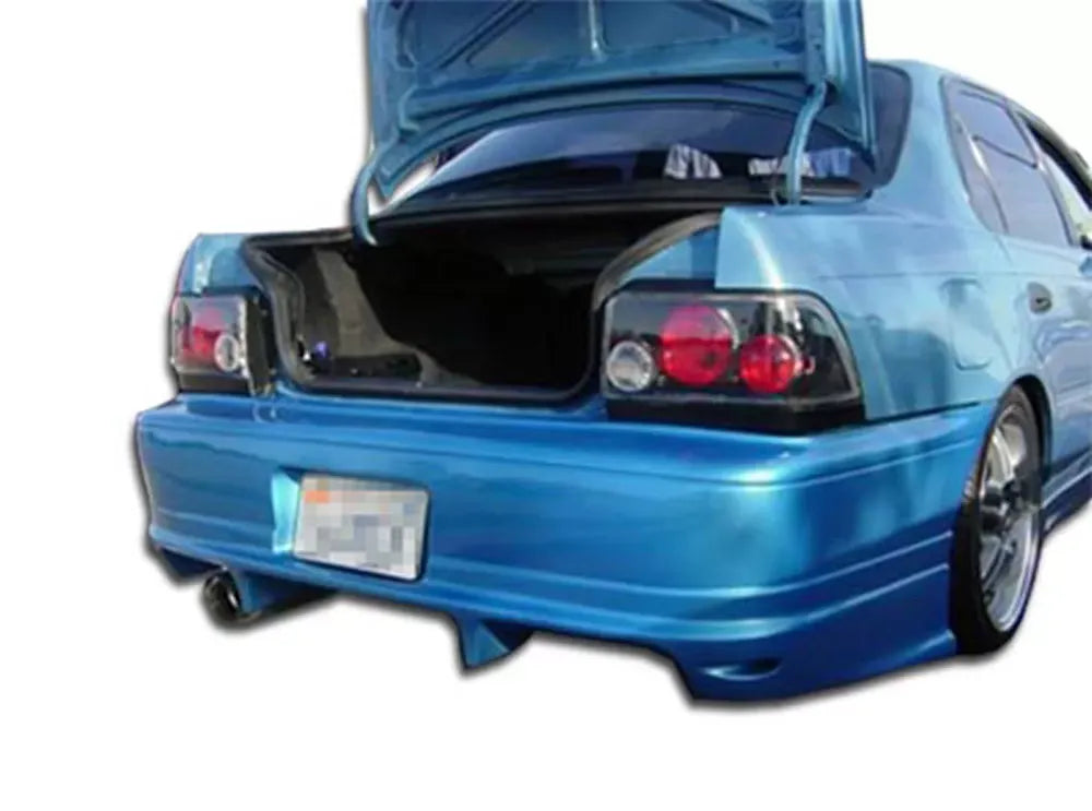 Duraflex Bomber Rear Bumper Cover Compatible With 1993-1997 Toyota Corolla - 1 Piece