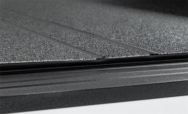 Access LOMAX Tri-Fold Cover 05-20 Nissan Frontier w/ 5ft Bed - Black Urethane B3030039